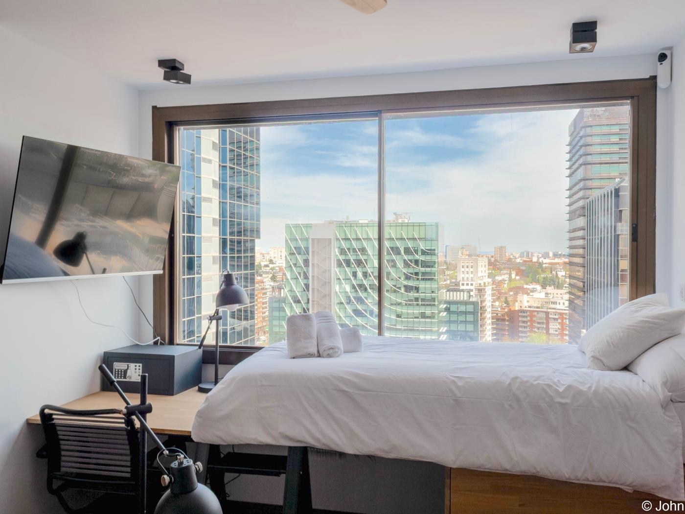Loft studio moderne avec vue sur la ville, piscine sur le toit - My Space Madrid Appartements