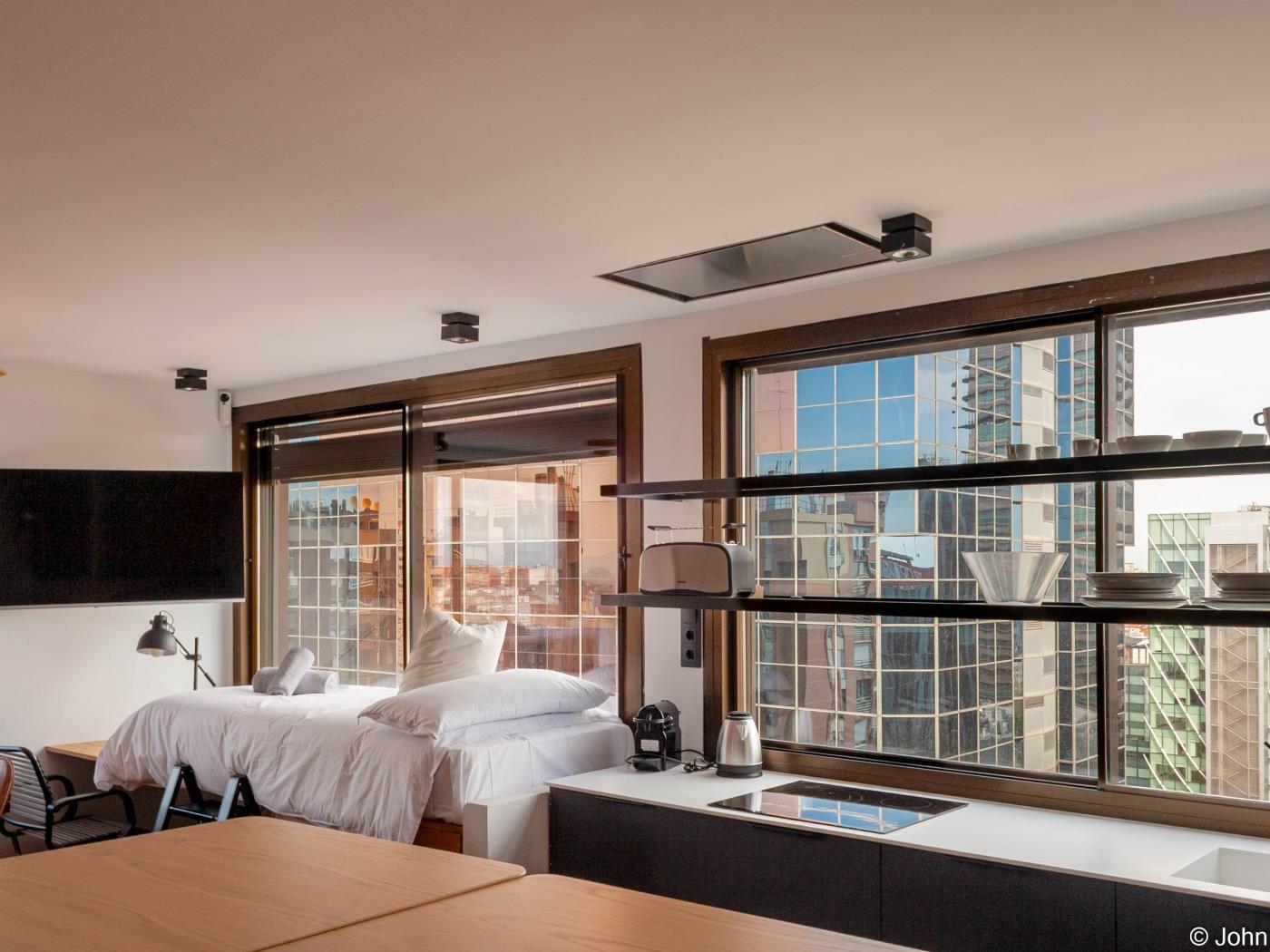 Chic Loft Studio avec Vue sur la Ville et Piscine sur le Toit - My Space Madrid Appartements